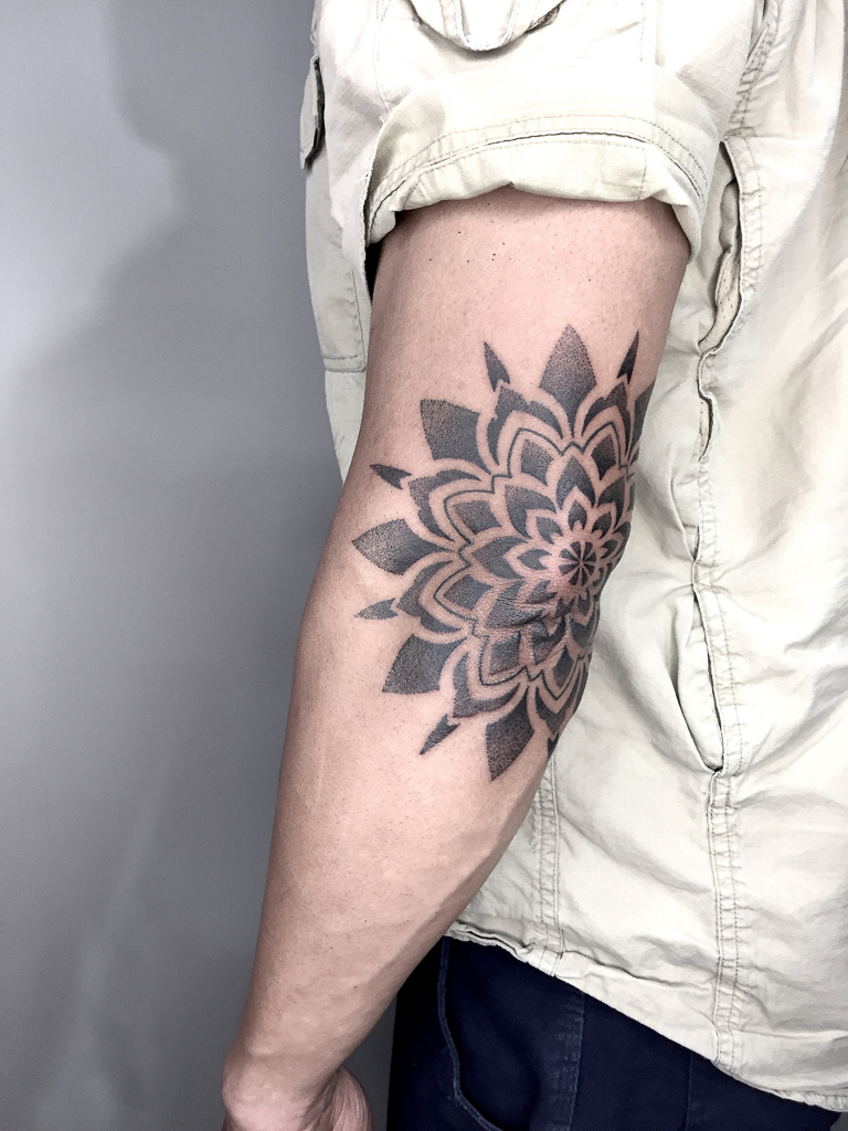 dotwork mandala elbow tattoo