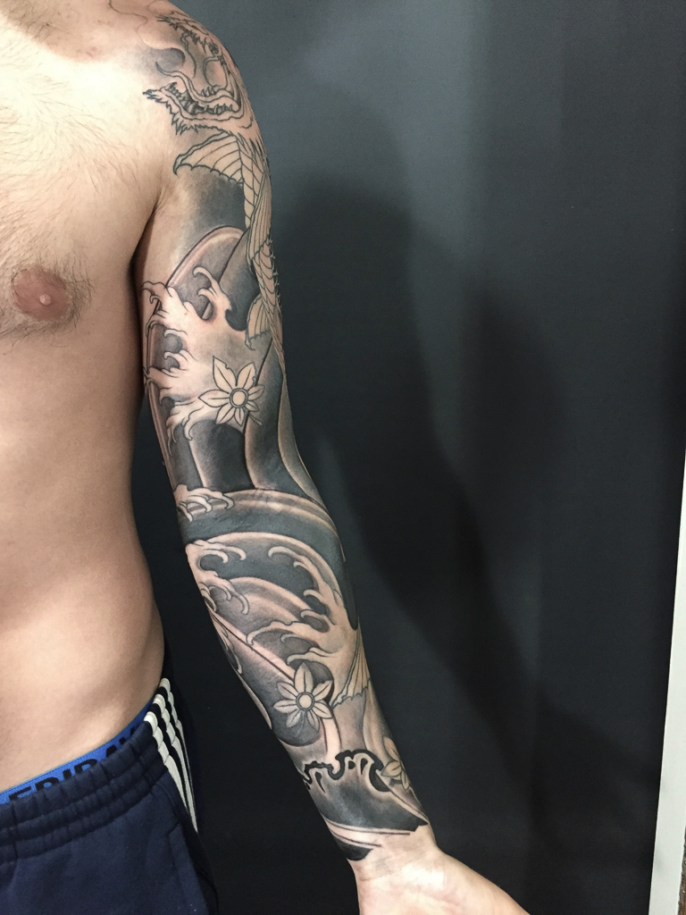 full sleeve japanese waves tattoo