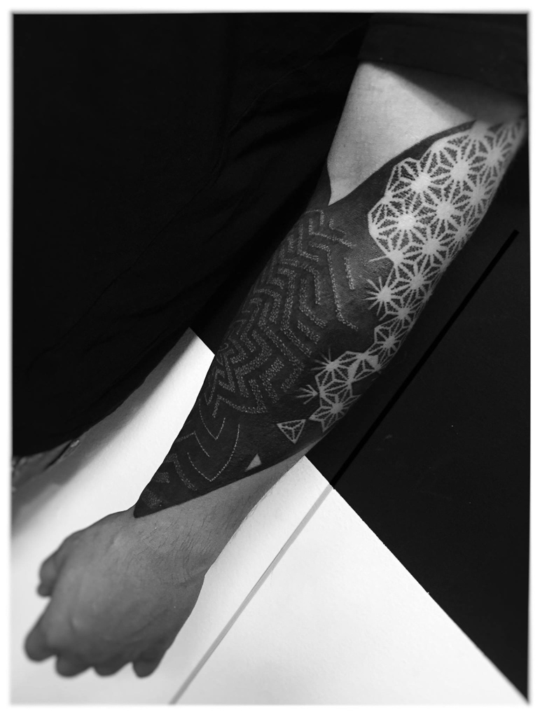 geometric cover-up tattoo