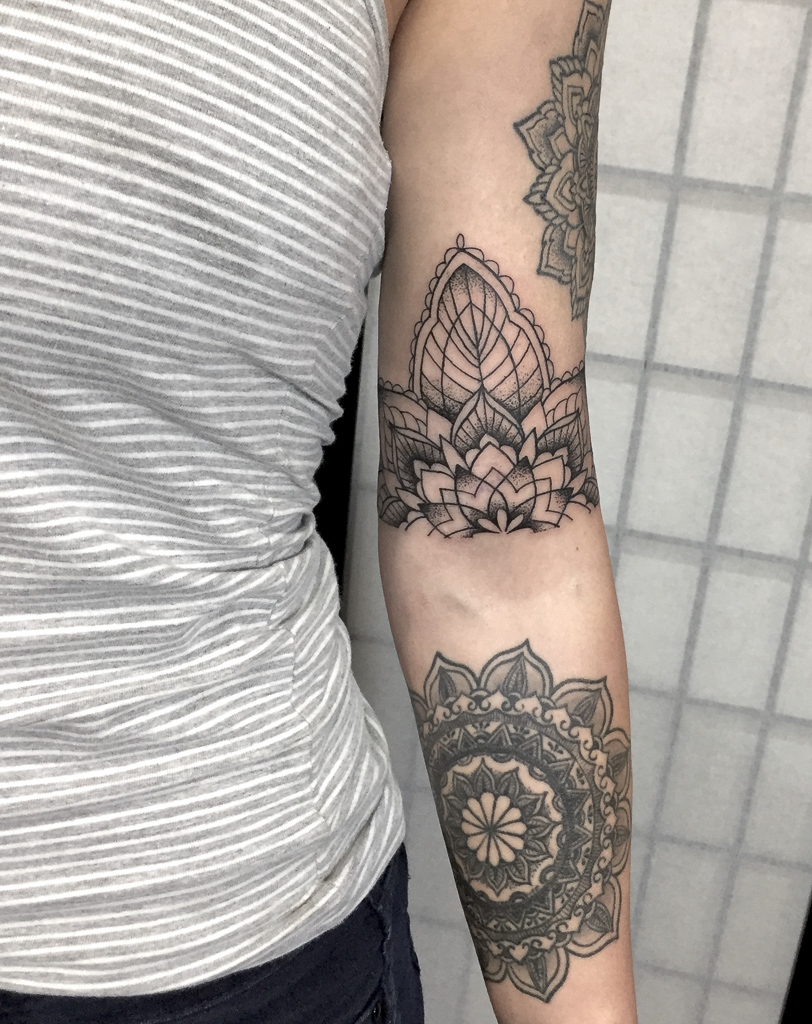 half mandala arm tattoo