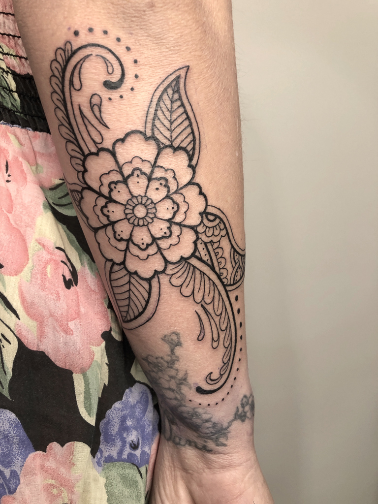henna style flower tattoo