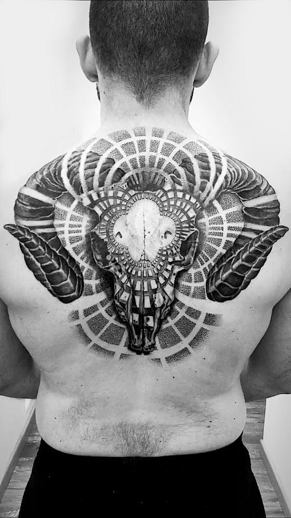 ram skull geometric tattoo