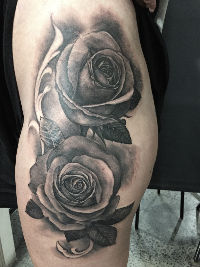 realistic black and grey best tattoo