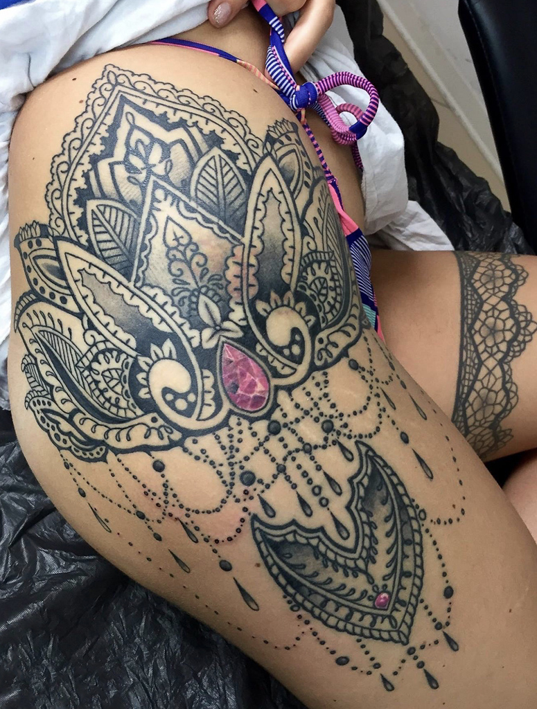 sexy lotus henna tattoo