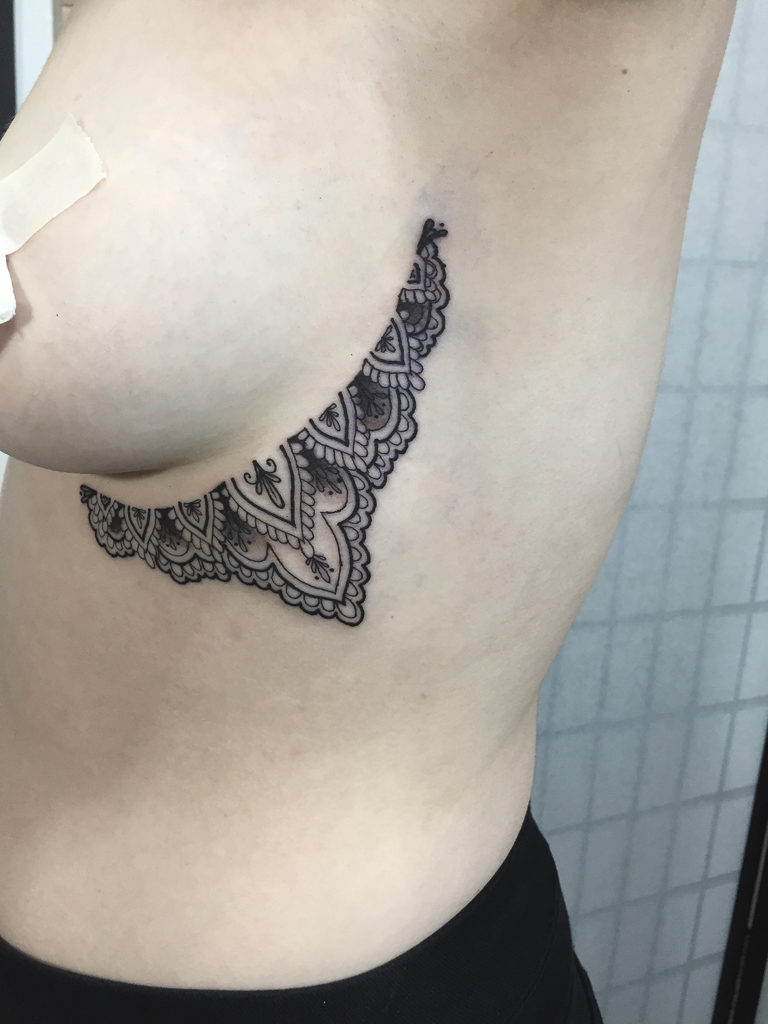 sexy under breast henna style tattoo