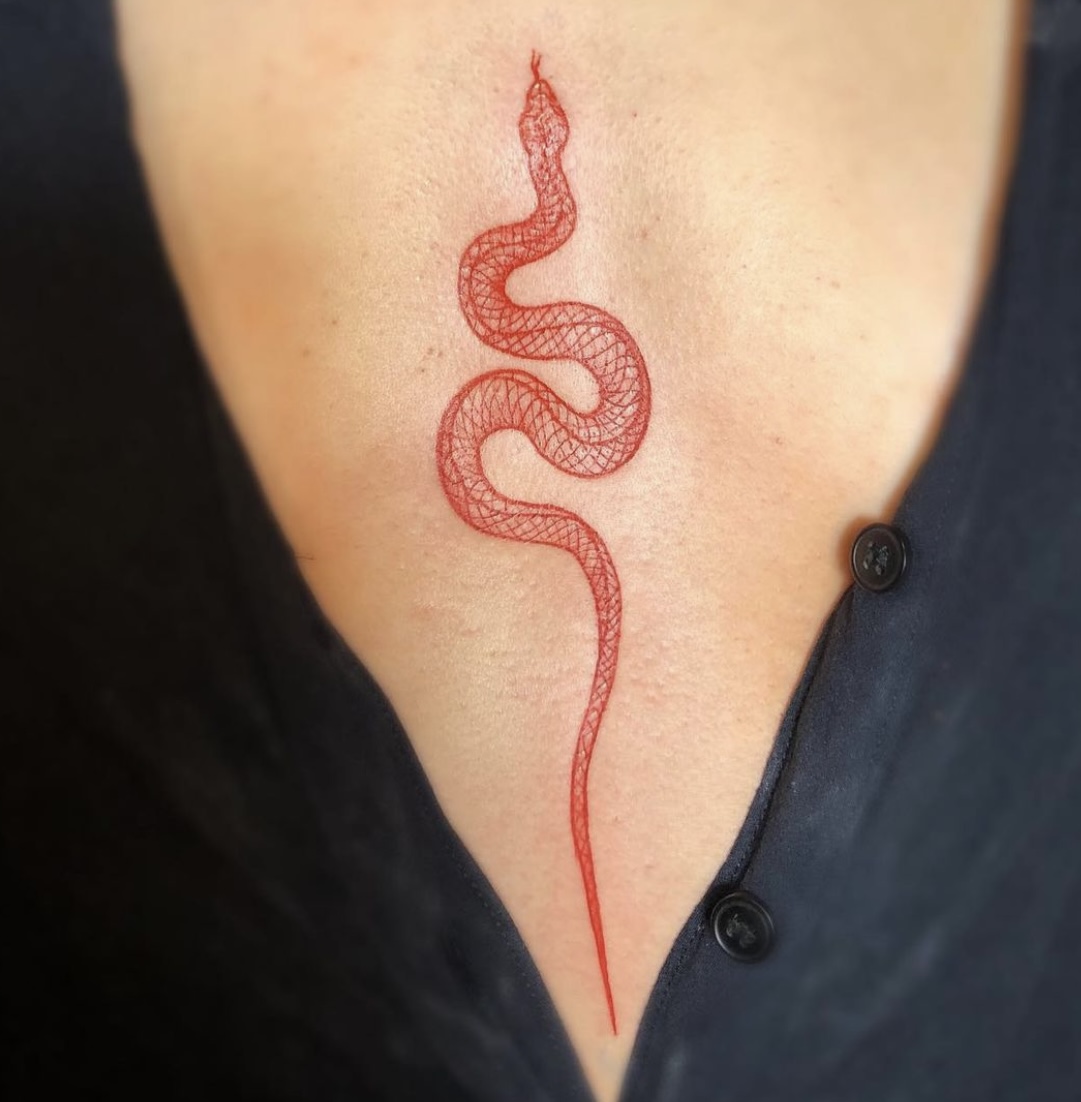 marcella ink snake tattoo boobs